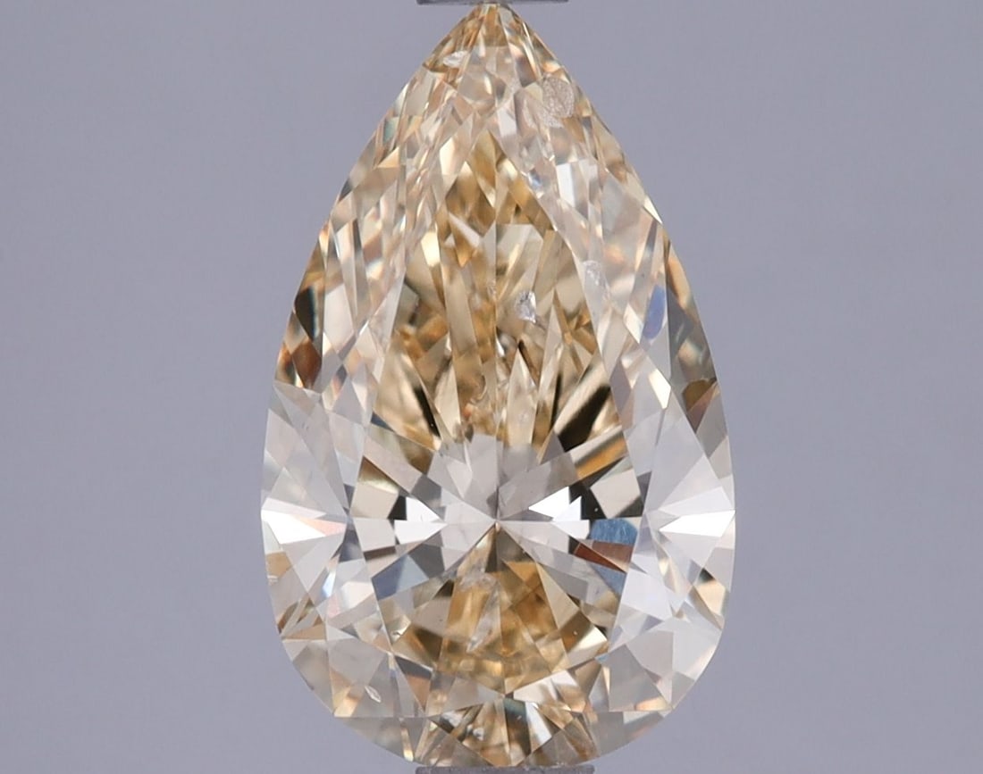 Loose Lab Diamond IGI Pear 1.51ct Fancy Intense Yellow SI1: Loose Lab Diamond IGI Pear 1.51ct Fancy Intense Yellow SI1 This 1.51ct loose lab diamond in a pear shape has a Fancy Intense Yellow color and SI1 clarity, certified by IGI with measurements 10.56L x 6