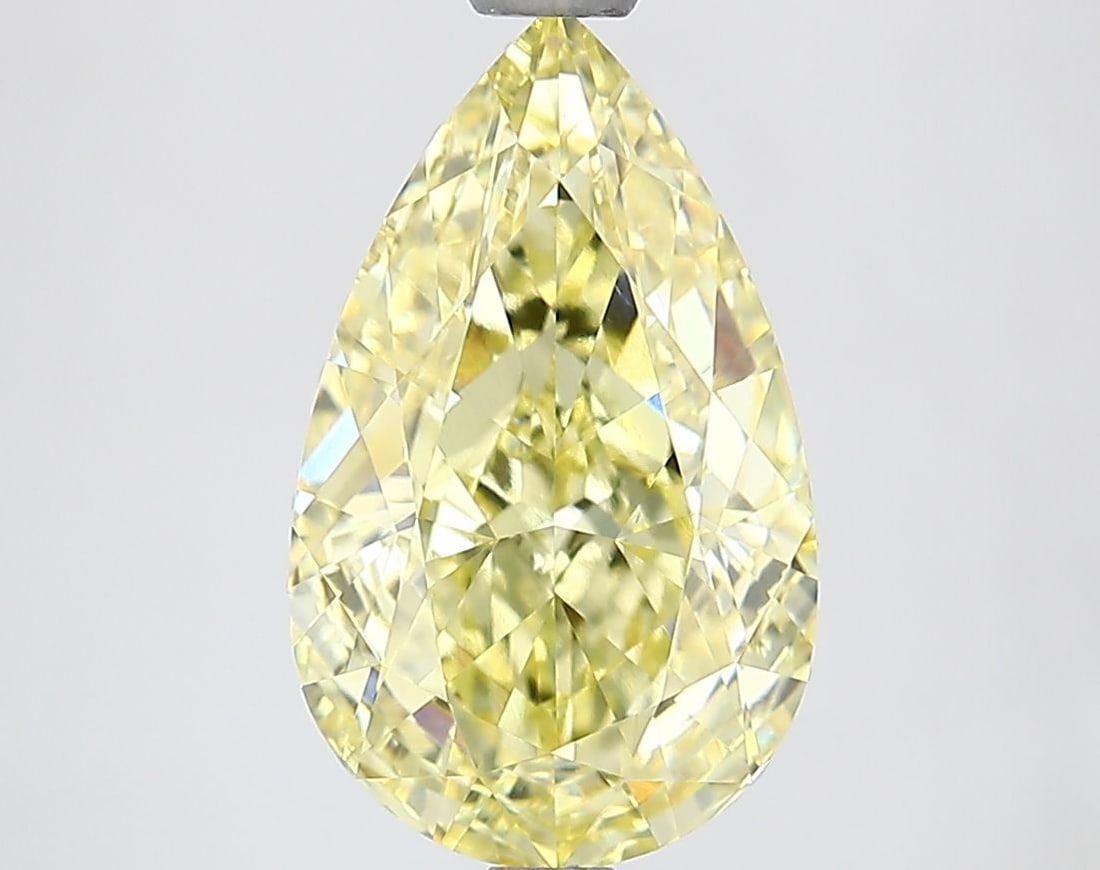 Loose Lab Diamond IGI Pear 3.02ct Fancy Vivid Yellow VS1: Loose Lab Diamond IGI Pear 3.02ct Fancy Vivid Yellow VS1 Loose lab-grown diamond, 3.02ct, Pear cut, Fancy Vivid Yellow color, Clarity VS1, certified by IGI, with excellent polish and symmetry. Item Sp