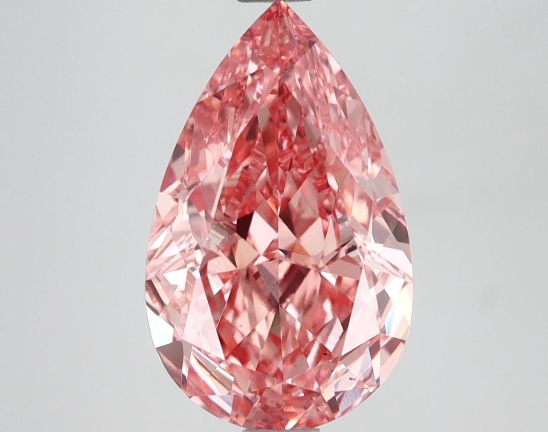 Pear 3.51ct Fancy Vivid Pink VS1 - Loose Lab Diamond IGI: Pear 3.51ct Fancy Vivid Pink VS1 - Loose Lab Diamond IGI This Loose Lab Diamond, weighing 3.51ct and shaped as a Pear, is Fancy Vivid Pink with VS1 clarity, certified by IGI, and measures 12.64L x 7.7