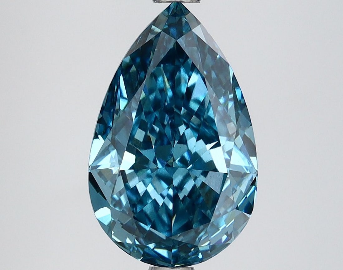 Loose Lab Diamond IGI Pear 3.09ct Fancy Vivid Blue VS1: Loose Lab Diamond IGI Pear 3.09ct Fancy Vivid Blue VS1 Loose lab diamond, 3.09ct pear shape, in fancy vivid blue color with VS1 clarity, showcasing excellent polish and symmetry, certified by IGI. Ite