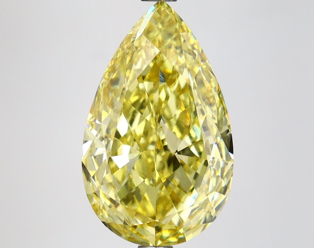 Loose Lab Diamond 4.47ct Fancy Vivid Yellow VS1 - IGI Pear: Loose Lab Diamond 4.47ct Fancy Vivid Yellow VS1 - IGI Pear Loose Lab Diamond of 4.47ct in a pear cut, featuring a Fancy Vivid Yellow color and VS1 clarity, with excellent polish and symmetry. Certifie