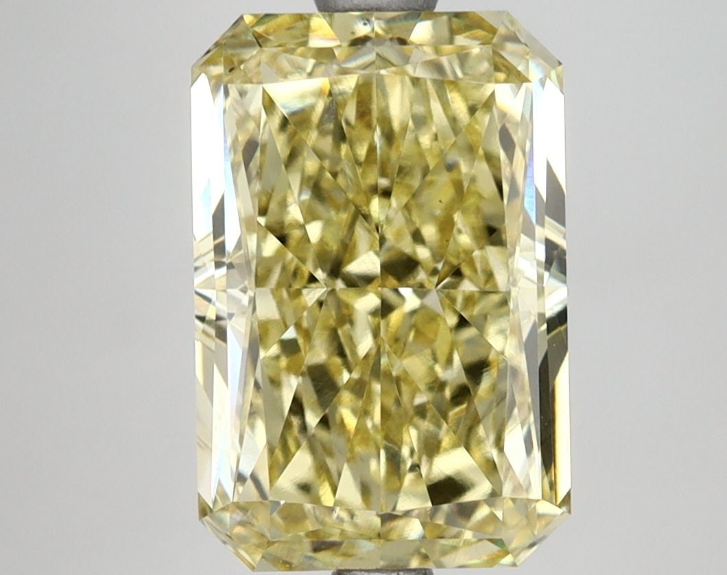 Loose Lab Diamond IGI Radiant 4.09ct Fancy Vivid Yellow VS1: Loose Lab Diamond IGI Radiant 4.09ct Fancy Vivid Yellow VS1 This Loose Lab Diamond features a 4.09ct radiant cut with Fancy Vivid Yellow color and VS1 clarity, certified by IGI, with excellent polish