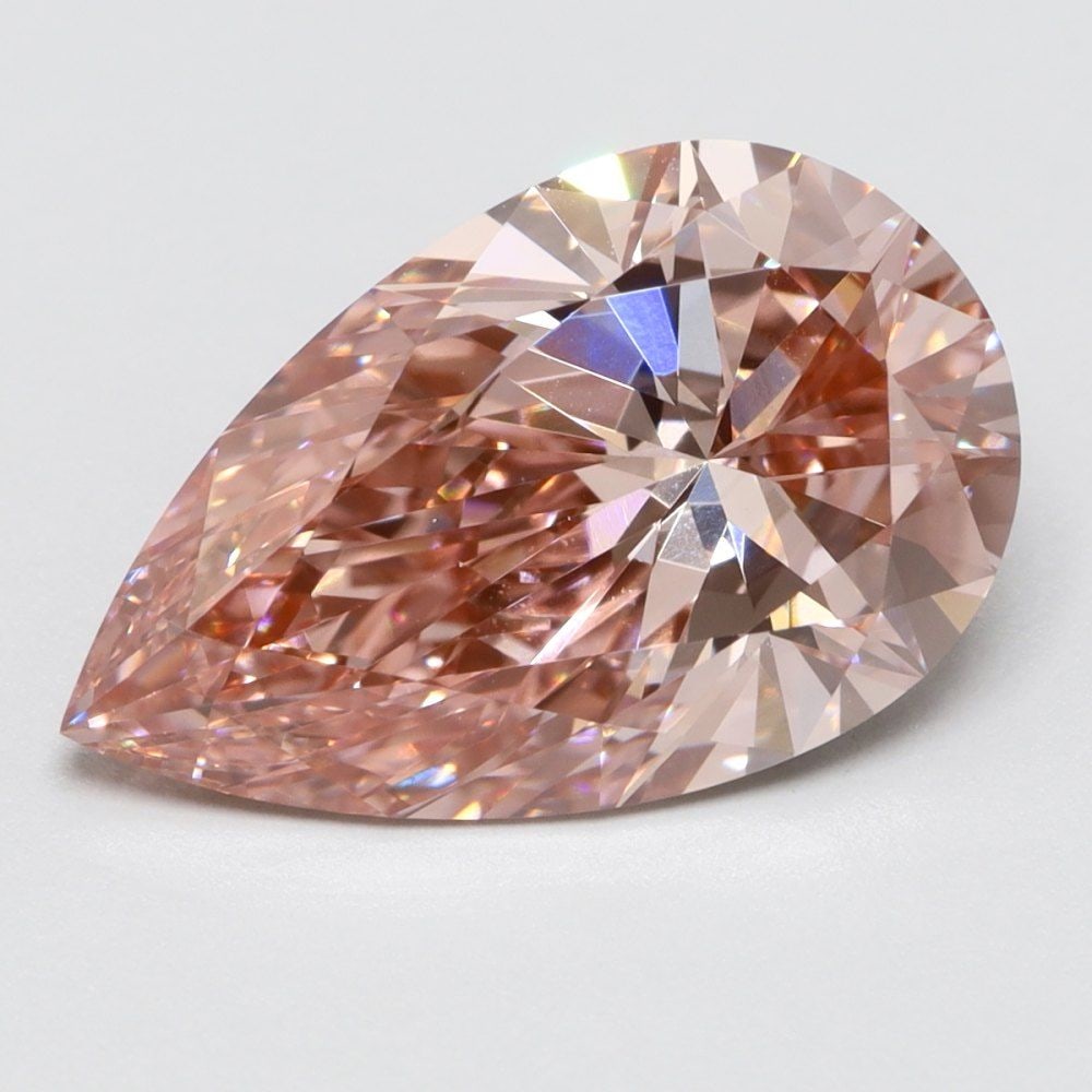 Loose Lab Diamond Pear 2.0ct Fancy Vivid Pink VS1: Loose Lab Diamond Pear 2.0ct Fancy Vivid Pink VS1 Loose lab-grown diamond weighing 2.0ct with a Fancy Vivid Pink color and VS1 clarity, VG polish and symmetry, and measurements of 11.4 x 7.1 x 4.3mm.