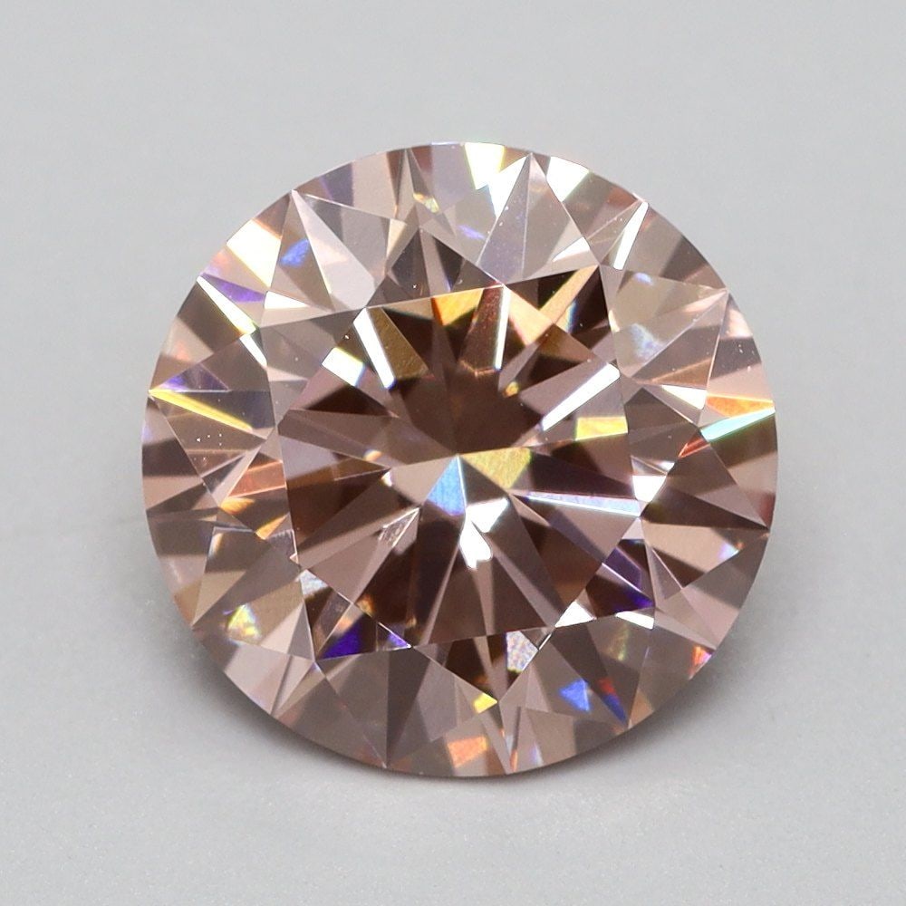 Loose Lab Diamond Round 1.33ct Fancy Intense Pink VVS2: Loose Lab Diamond Round 1.33ct Fancy Intense Pink VVS2 Loose lab-grown diamond weighing 1.33ct in Fancy Intense Pink color and VVS2 clarity, VG polish and symmetry, with measurements of 7.1 x 7.1 x 4.