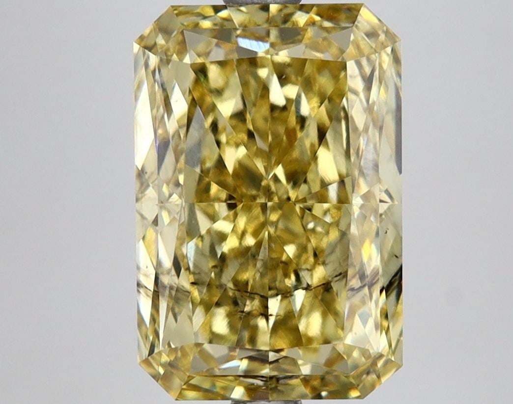 Loose Lab Diamond IGI Radiant 4.16ct Fancy Vivid Yellow SI1: Loose Lab Diamond IGI Radiant 4.16ct Fancy Vivid Yellow SI1 Loose Lab Diamond IGI Radiant, 4.16ct, Fancy Vivid Yellow, SI1 clarity, with IGI certification and measurements of 11.12L x 7.51W x 5.1H. It