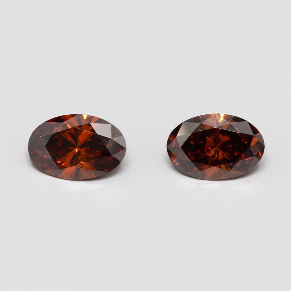 Loose Lab Diamond Oval 1.07ct Fancy Red VS1: Loose Lab Diamond Oval 1.07ct Fancy Red VS1 Loose lab-grown diamond weighing 1.07ct, featuring a Fancy Red color grade and clarity VS1, both with very good polish and symmetry. Its dimensions are 8.69