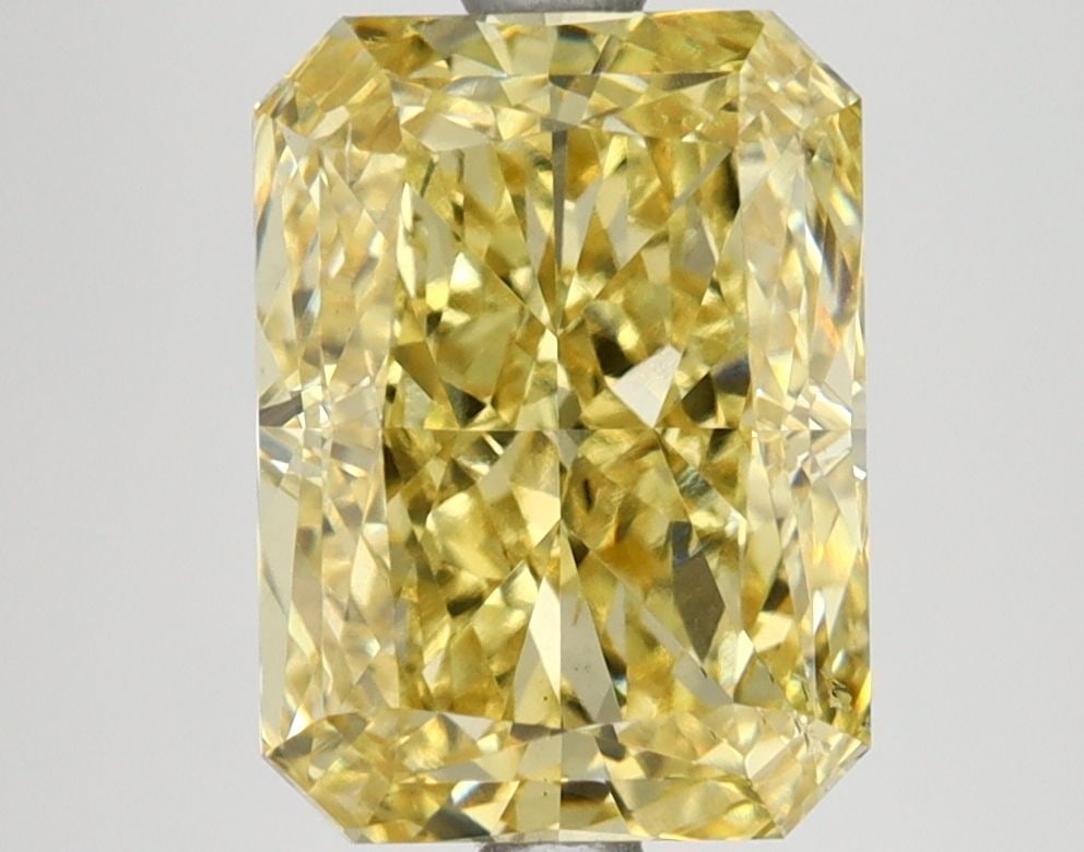 Loose Lab Diamond IGI Radiant 4.06ct Fancy Vivid Yellow SI1: Loose Lab Diamond IGI Radiant 4.06ct Fancy Vivid Yellow SI1 Loose lab-grown diamond weighing 4.06 carats, radiant cut, fancy vivid yellow color, SI1 clarity, with EX polish and symmetry, certified by