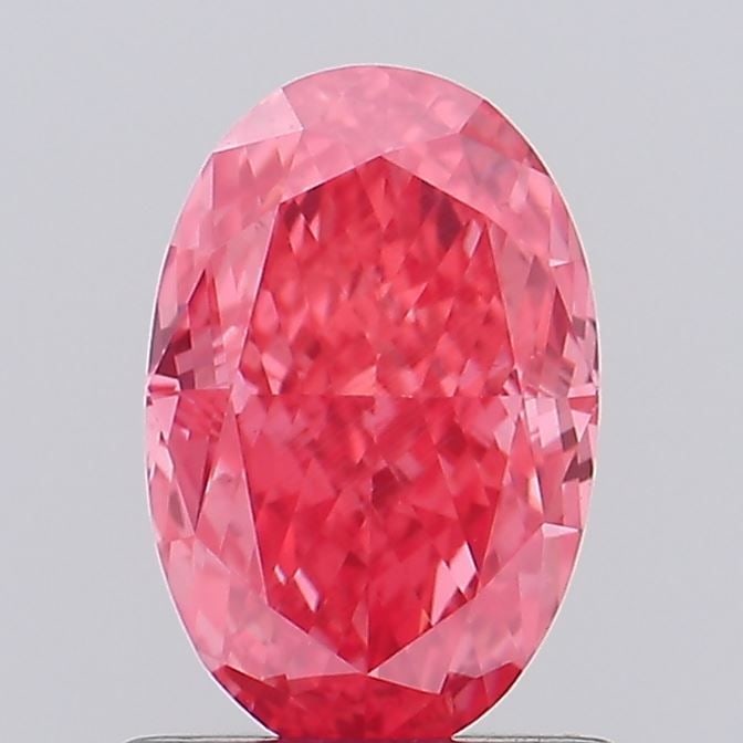 Loose Lab Diamond IGI Oval 1.02ct Fancy Vivid Pink VS1: Loose Lab Diamond IGI Oval 1.02ct Fancy Vivid Pink VS1 Loose Lab Diamond IGI Oval 1.02ct displaying fancy vivid pink color, clarity VS1, and dimensions of 7.74L x 5.06W x 3.27H, certified by IGI. Item