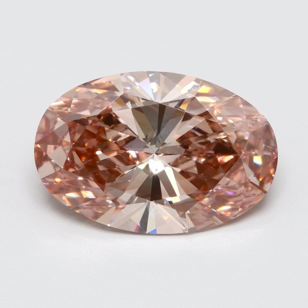 Loose Lab Diamond Oval 2.92ct Fancy Vivid Reddish Pink VS1: Loose Lab Diamond Oval 2.92ct Fancy Vivid Reddish Pink VS1 Loose Lab Diamond weighing 2.92ct, color Fancy Vivid Reddish Pink, clarity VS1, with dimensions of 12.07L x 8.1W x 4.75H, no certification. I