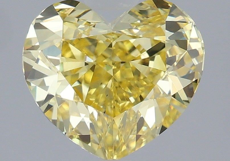 Loose Lab Diamond 3.03ct Fancy Vivid Yellow VS1 - IGI Heart: Loose Lab Diamond 3.03ct Fancy Vivid Yellow VS1 - IGI Heart This 3.03ct Loose Lab Diamond has a Fancy Vivid Yellow color and VS1 clarity, with dimensions of 8.24L x 9.19W x 5.56H, certified by IGI. It