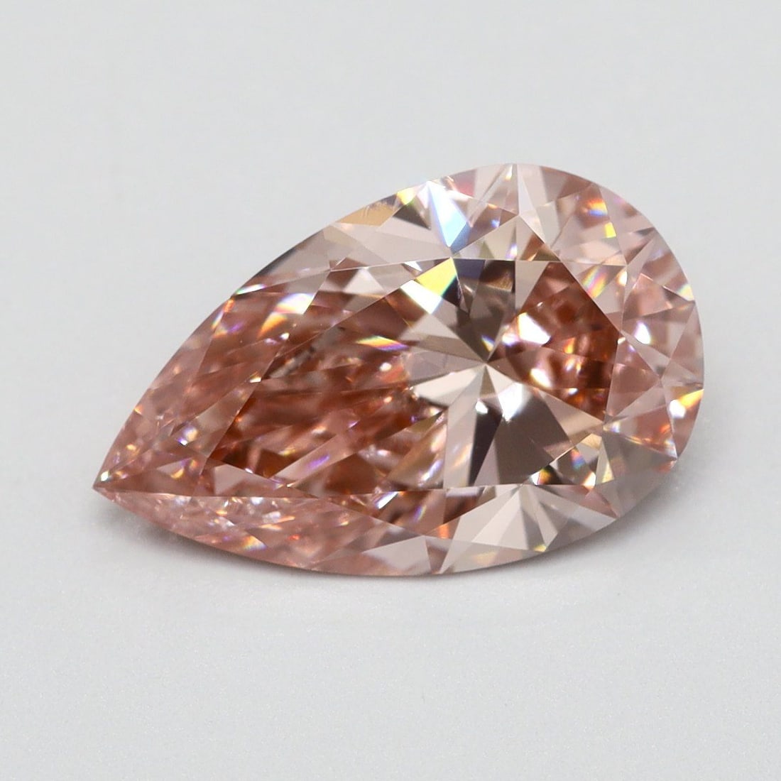 Loose Lab Diamond Pear 1.3ct Fancy Vivid Pink VS1: Loose Lab Diamond Pear 1.3ct Fancy Vivid Pink VS1 Loose Lab Diamond Pear, 1.3ct, Color: Fancy Vivid Pink, Clarity: VS1, with VG Polish and Symmetry, measures 9.8L x 6.1W x 3.6H, not certified. Item Sp
