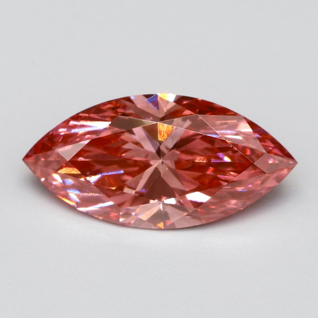 Loose Lab Diamond Marquise 1.02ct Fancy Vivid Pink VS2: Loose Lab Diamond Marquise 1.02ct Fancy Vivid Pink VS2 Loose lab-grown diamond weighing 1.02ct with a marquise cut, fancy vivid pink color, and VS2 clarity. No certification and measurements are 10.61