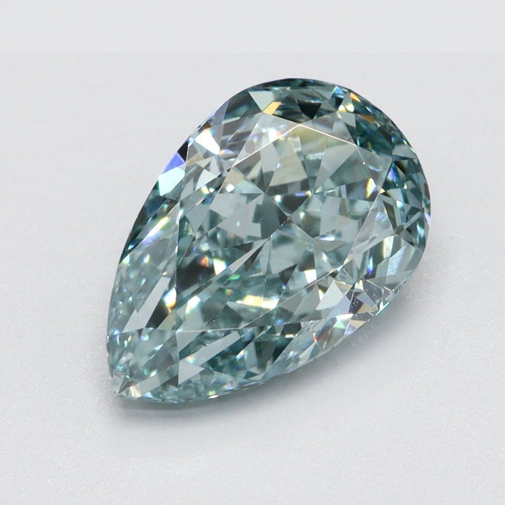 Loose Lab Diamond 1.1ct Fancy Vivid Greenish Blue VS2 - Pear: Loose Lab Diamond 1.1ct Fancy Vivid Greenish Blue VS2 - Pear Loose lab-grown diamond weighing 1.1ct, pear cut, fancy vivid greenish blue color, clarity VS2, with very good polish and symmetry, not cer