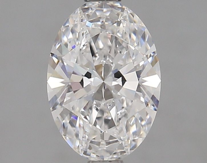 Loose Lab Diamond GIA Oval 1.5ct D VVS1: Loose Lab Diamond GIA Oval 1.5ct D VVS1 Loose lab-grown diamond of 1.5ct in an oval cut, featuring D color, VVS1 clarity, and excellent symmetry, with measurements of 9.33L x 6.51W x 4.0H; certified b