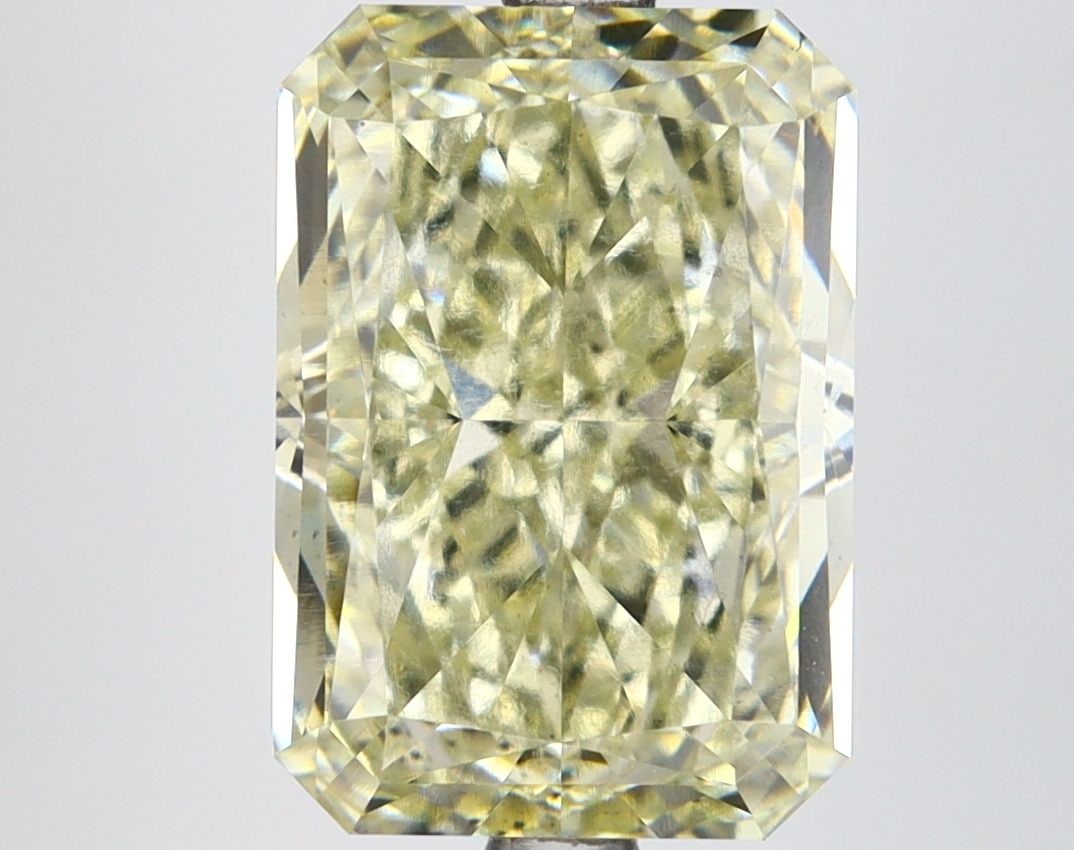 Loose Lab Diamond IGI Radiant 4.99ct Fancy Yellow VS2: Loose Lab Diamond IGI Radiant 4.99ct Fancy Yellow VS2 This loose lab-grown diamond weighs 4.99ct, features a radiant cut, fancy yellow color, and VS2 clarity with excellent polish and symmetry, certif