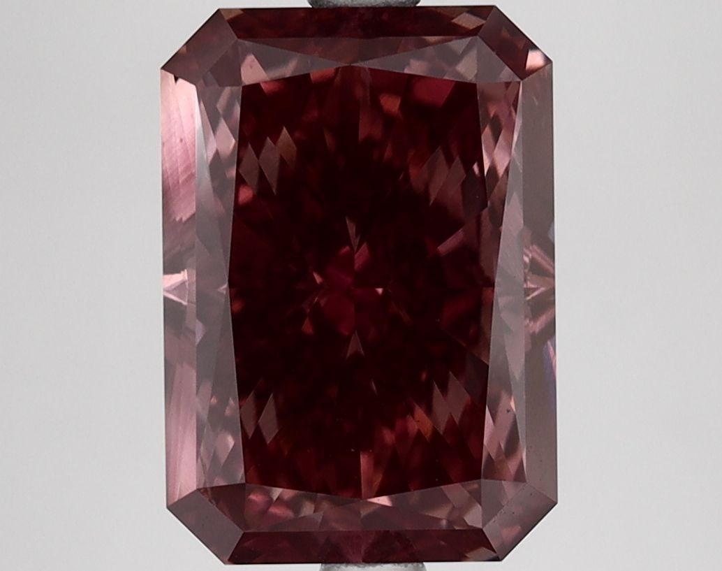 Loose Lab Diamond 4.26ct Fancy Pinkish Brown VS2 - IGI Radiant: Loose Lab Diamond 4.26ct Fancy Pinkish Brown VS2 - IGI Radiant Loose Lab Diamond weighing 4.26ct, showcasing a Fancy Pinkish Brown color with VS2 clarity, certified by IGI. Measurements are 10.82L x 7