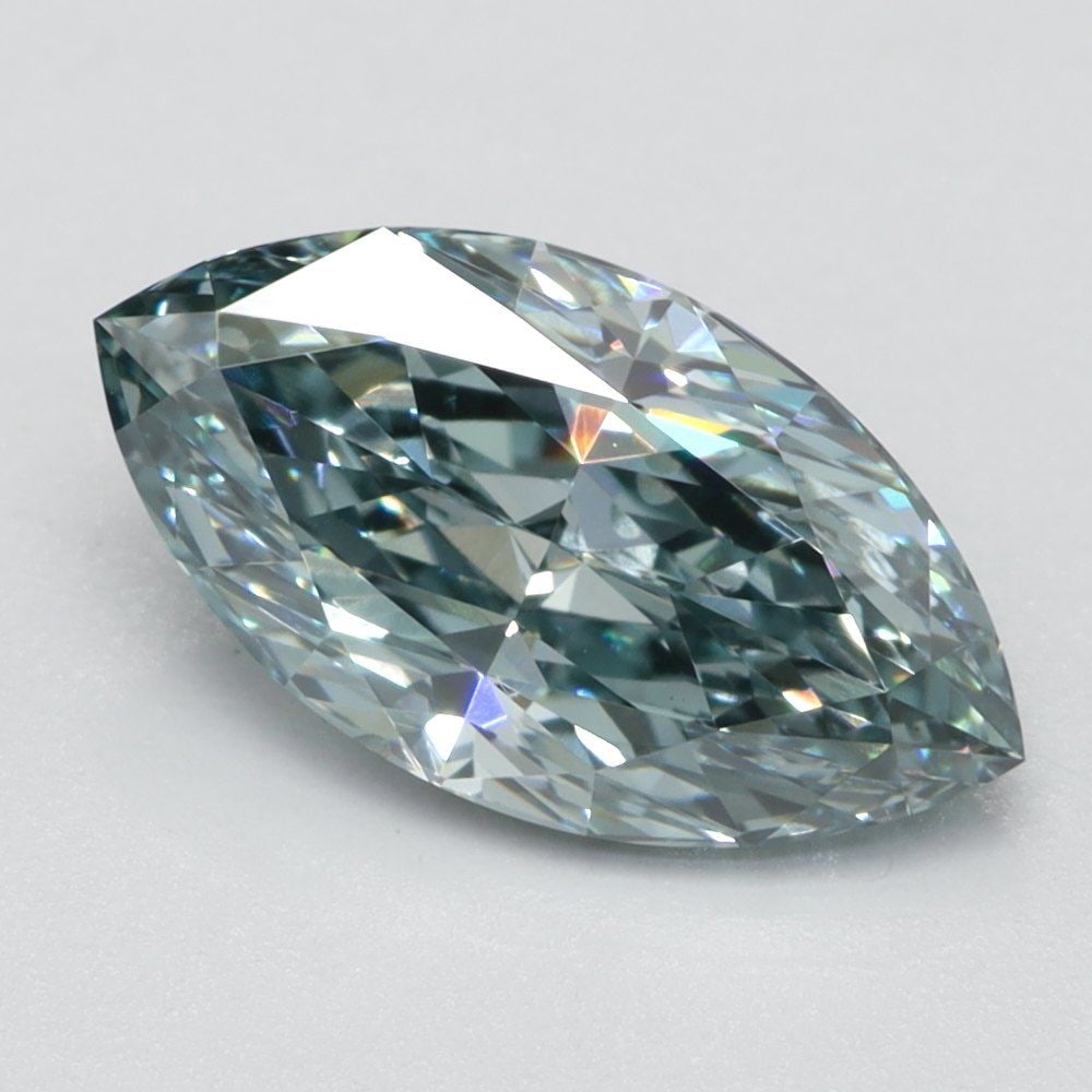 Loose Lab Diamond 1.14ct Marquise Fancy Vivid Greenish Blue VS1: Loose Lab Diamond 1.14ct Marquise Fancy Vivid Greenish Blue VS1 Loose lab-grown diamond weighing 1.14ct, marquise cut, fancy vivid greenish blue color, VS1 clarity, VG polish, and VG symmetry; not cer