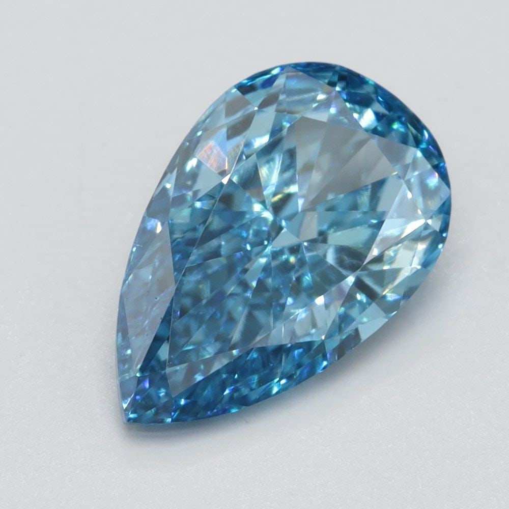 Loose Lab Diamond Pear 1.08ct Fancy Vivid Blue VS1: Loose Lab Diamond Pear 1.08ct Fancy Vivid Blue VS1 Loose Lab Diamond weighing 1.08ct, with a pear cut, fancy vivid blue color, and VS1 clarity, with no certification. Item Specifics: Source: This Is A