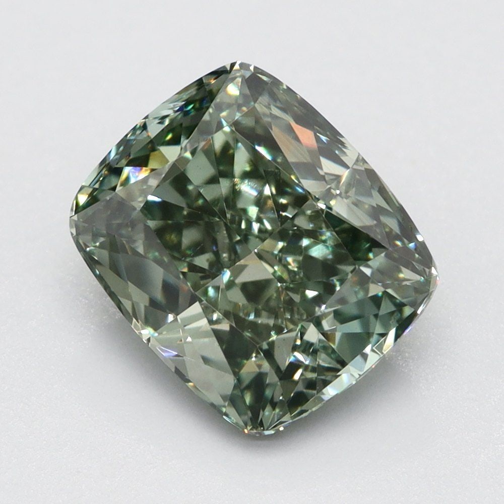 Loose Lab Diamond Cushion Brilliant 1.38ct Fancy Vivid Green VS2: Loose Lab Diamond Cushion Brilliant 1.38ct Fancy Vivid Green VS2 Loose Lab Diamond weighing 1.38ct, features a Fancy Vivid Green color and VS2 clarity. Measurements are 6.9L x 5.8W x 4.0H, with no cer