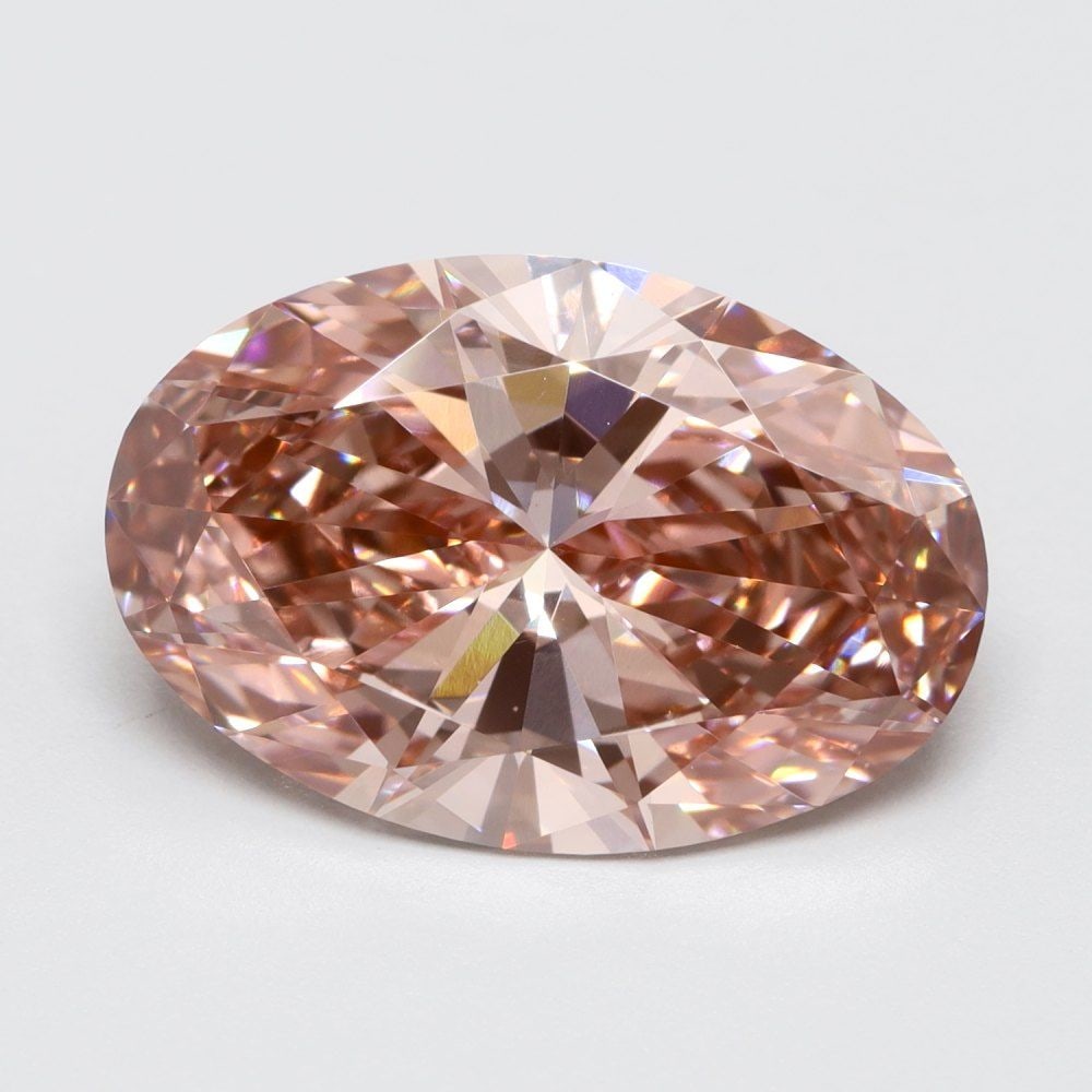 Loose Lab Diamond Oval 3.08ct Fancy Vivid Pink VS1: Loose Lab Diamond Oval 3.08ct Fancy Vivid Pink VS1 Loose Lab Diamond Oval, 3.08ct, Fancy Vivid Pink color, VS1 clarity, VG polish, VG symmetry, measures 12.35L x 8.28W x 4.75H, with no certification.