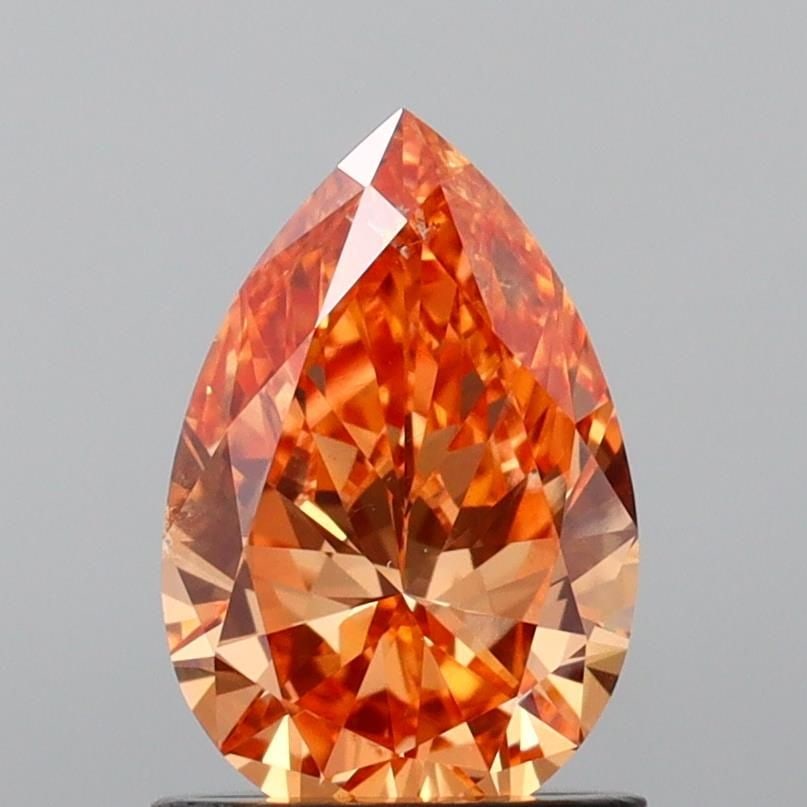 Loose Lab Diamond IGI Pear 1.02ct Fancy Vivid Pinkish Orange VS2: Loose Lab Diamond IGI Pear 1.02ct Fancy Vivid Pinkish Orange VS2 Loose Lab Diamond IGI Pear 1.02ct Fancy Vivid Pinkish Orange VS2, featuring excellent polish and symmetry, certified by IGI. Item Speci