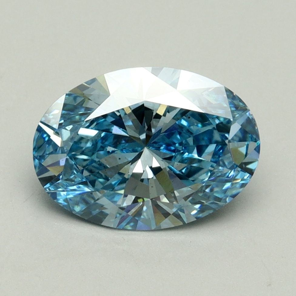 Loose Lab Diamond IGI Oval 2.0ct Fancy Vivid Blue VS1: Loose Lab Diamond IGI Oval 2.0ct Fancy Vivid Blue VS1 Loose lab-grown diamond featuring a 2.0ct oval cut, fancy vivid blue color, VS1 clarity, and IGI certification. Its dimensions are 10.12L x 7.25W