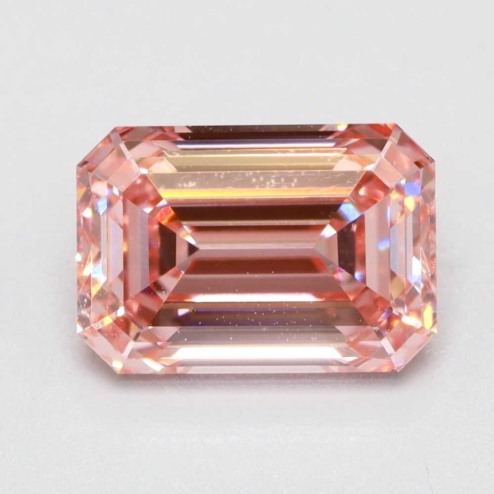 Loose Lab Diamond 1.33ct Fancy Vivid Pink VS1 - Emerald: Loose Lab Diamond 1.33ct Fancy Vivid Pink VS1 - Emerald Loose lab-grown diamond weighing 1.33ct, emerald cut, fancy vivid pink color, and VS1 clarity, with dimensions of 7.34L x 5.06W x 3.45H. Certifi