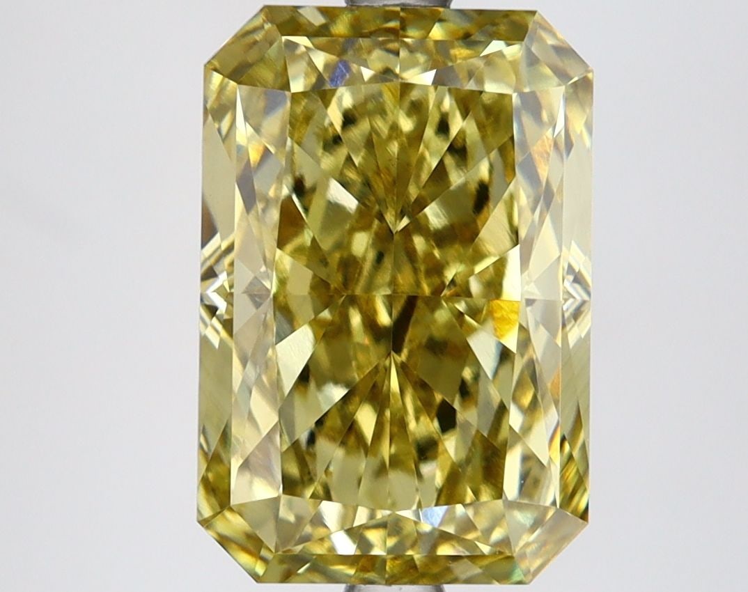 Loose Lab Diamond 4.58ct Fancy Vivid Yellow VS2 - IGI Radiant: Loose Lab Diamond 4.58ct Fancy Vivid Yellow VS2 - IGI Radiant Loose lab-grown diamond weighing 4.58ct, radiant cut, fancy vivid yellow color and VS2 clarity, measuring 11.37L x 7.69W x 5.38H. Certifie