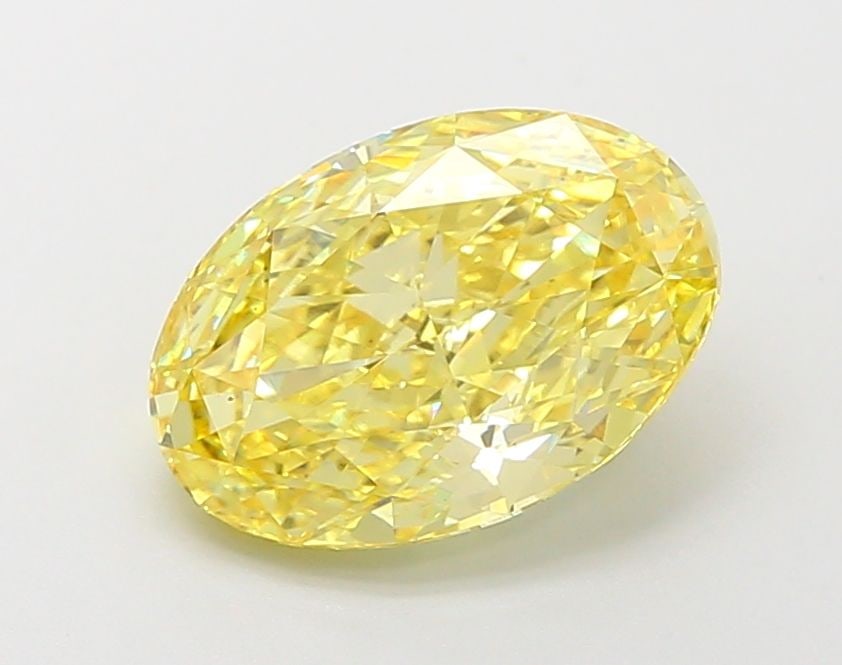 Loose Lab Diamond IGI Oval 3.05ct Fancy Vivid Yellow VS2: Loose Lab Diamond IGI Oval 3.05ct Fancy Vivid Yellow VS2 Loose lab-grown diamond of 3.05ct, with a fancy vivid yellow color and VS2 clarity, certified by IGI, featuring excellent polish and symmetry.