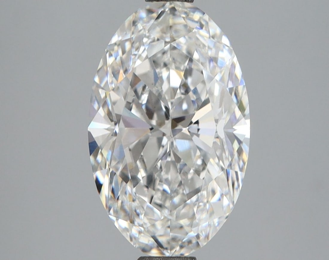 Loose Lab Diamond IGI Oval 3.07ct E VVS2: Loose Lab Diamond IGI Oval 3.07ct E VVS2 Loose lab diamond IGI certified, weighing 3.07ct with an E color and VVS2 clarity. It features excellent polish and symmetry, measuring 12.36L x 7.73W x 4.82H.
