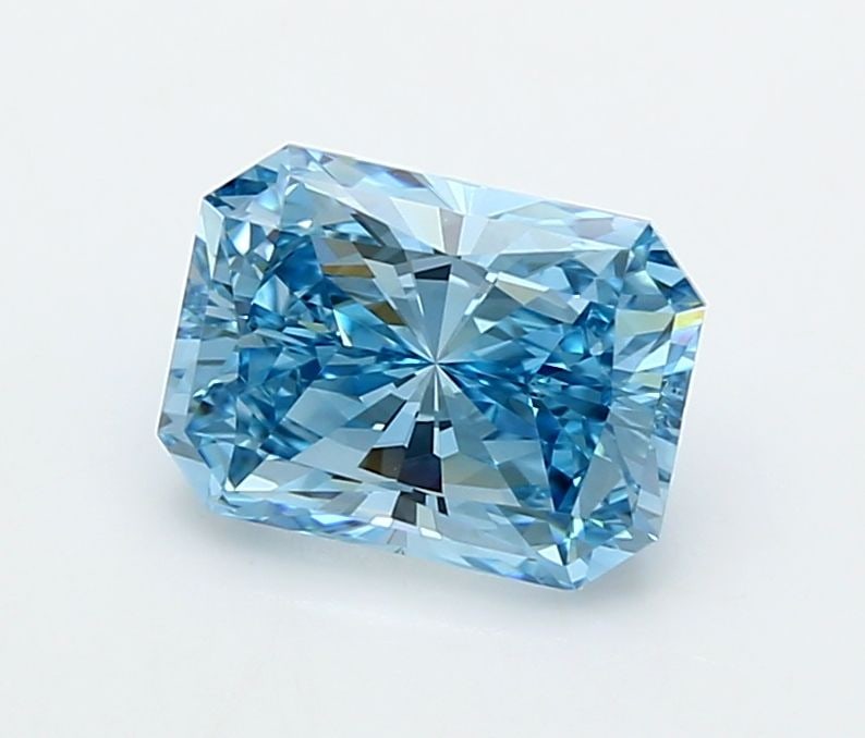 Loose Lab Diamond 2.21ct IGI Radiant Fancy Vivid Blue VS1: Loose Lab Diamond 2.21ct IGI Radiant Fancy Vivid Blue VS1 Loose Lab Diamond of 2.21ct in a Radiant shape, Fancy Vivid Blue color, VS1 clarity, and IGI certified; measures 8.8L x 6.47W x 4.61H. Item