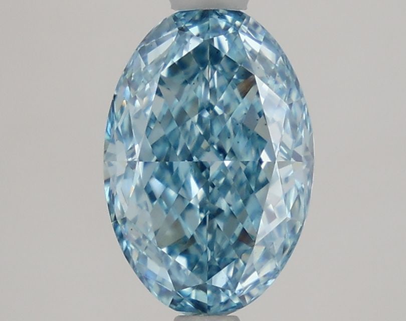 Loose Lab Diamond 1.71ct Fancy Vivid Blue VS1 - IGI Oval: Loose Lab Diamond 1.71ct Fancy Vivid Blue VS1 - IGI Oval Loose Lab Diamond, 1.71ct, Fancy Vivid Blue, VS1 clarity, with EX Polish and EX Symmetry. Certified by IGI, measuring 9.92L x 6.67W x 3.64H. It