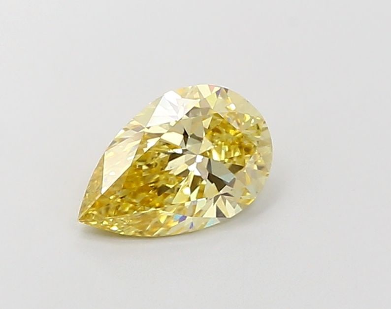 Loose Lab Diamond IGI Pear 1.5ct Fancy Intense Yellow VS1: Loose Lab Diamond IGI Pear 1.5ct Fancy Intense Yellow VS1 Loose Lab Diamond IGI Pear weighing 1.5ct, featuring Fancy Intense Yellow color and VS1 clarity; certified by IGI, with dimensions 9.94L x 6.5