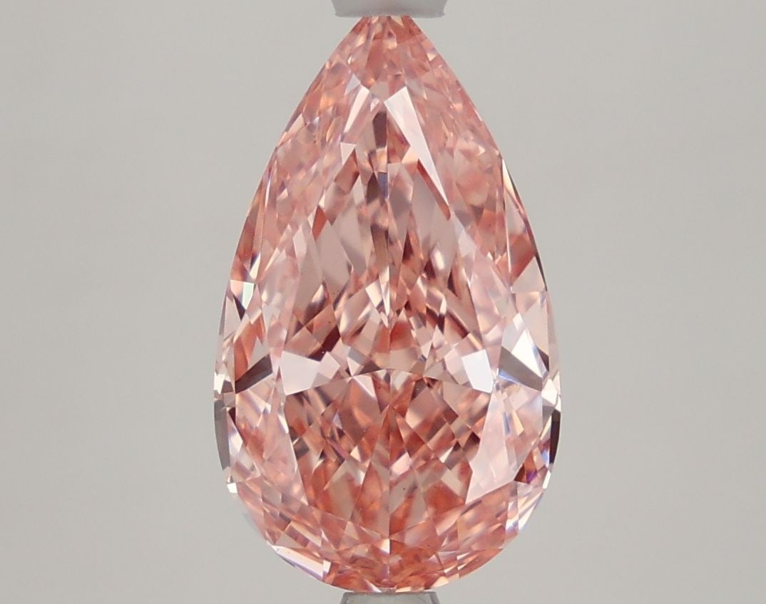 Loose Lab Diamond IGI Pear 3.2ct Fancy Vivid Pink VS1: Loose Lab Diamond IGI Pear 3.2ct Fancy Vivid Pink VS1 Loose Lab Diamond IGI Pear 3.2ct in Fancy Vivid Pink with VS1 clarity, exhibiting excellent polish and symmetry. Certified by IGI, it measures 13.