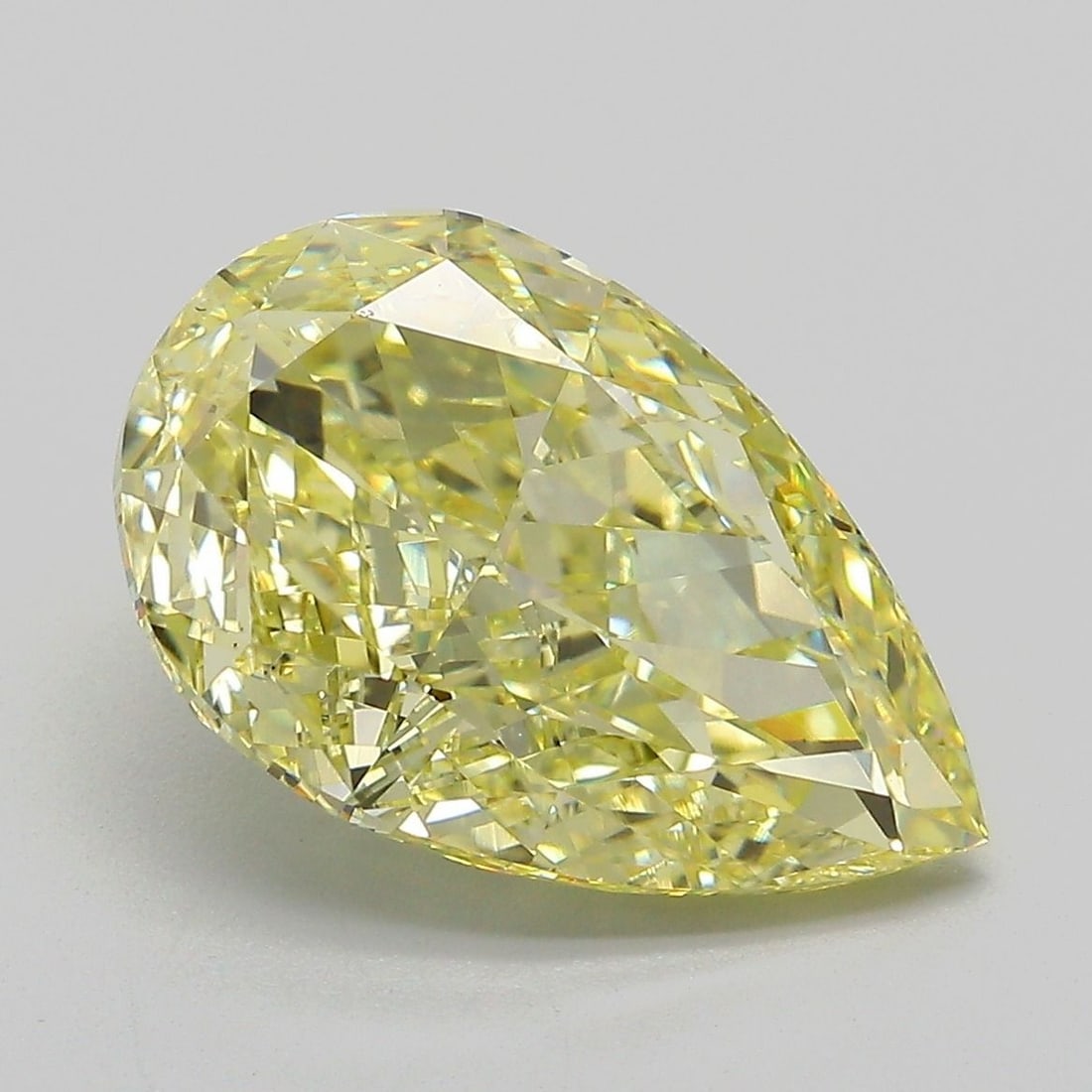 Loose Lab Diamond IGI Pear 5.0ct Fancy Intense Yellow VS1: Loose Lab Diamond IGI Pear 5.0ct Fancy Intense Yellow VS1 Loose Lab Diamond, IGI certified, weighing 5.0ct, with a pear cut, color Fancy Intense Yellow, clarity VS1, and measurements of 14.56L x 9.26W