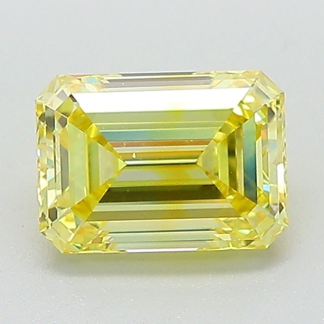 Loose Lab Diamond 1.27ct Fancy Vivid Yellow VVS2 - IGI Emerald: Loose Lab Diamond 1.27ct Fancy Vivid Yellow VVS2 - IGI Emerald Loose Lab Diamond weighing 1.27ct, cut in an emerald shape, with a Fancy Vivid Yellow color and VVS2 clarity, certified by IGI. Item Spec