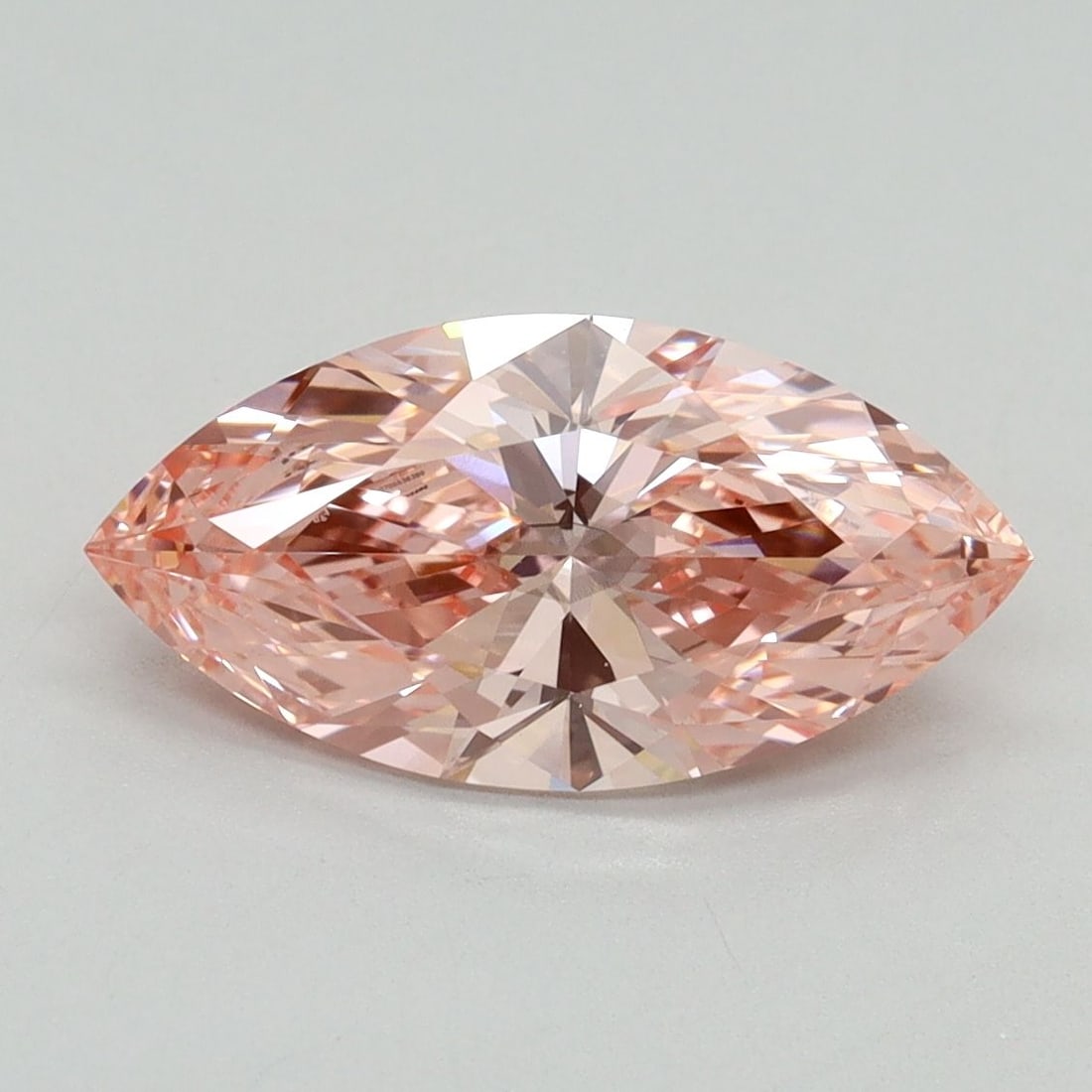 IGI 1.99ct Marquise Fancy Vivid Pink VS2 - Loose Lab Diamond: IGI 1.99ct Marquise Fancy Vivid Pink VS2 - Loose Lab Diamond Loose lab diamond weighing 1.99 carats in a marquise cut with fancy vivid pink color and VS2 clarity, featuring excellent polish and very g