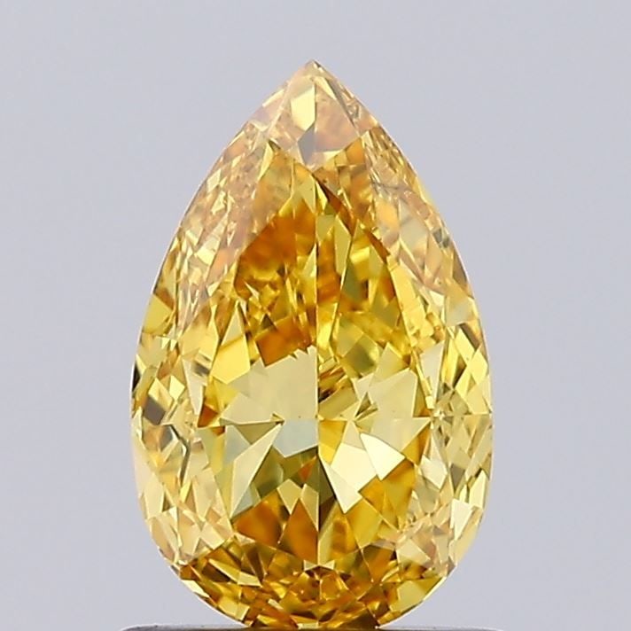 Loose Lab Diamond IGI Pear 1.09ct Fancy Vivid Yellow VS1: Loose Lab Diamond IGI Pear 1.09ct Fancy Vivid Yellow VS1 Loose Lab Diamond IGI Pear cut, 1.09ct, fancy vivid yellow, clarity VS1, featuring excellent polish and very good symmetry; certified by IGI. 