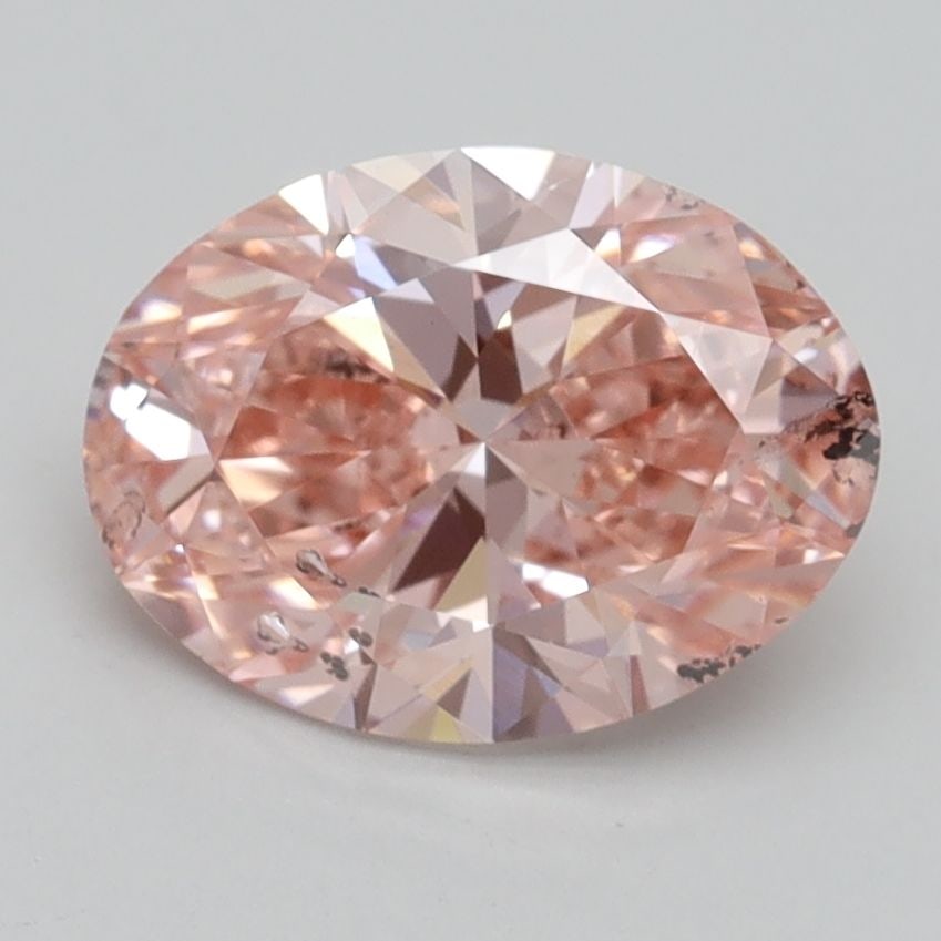 Loose Lab Diamond IGI 1.99ct Oval Fancy Vivid Pink SI2: Loose Lab Diamond IGI 1.99ct Oval Fancy Vivid Pink SI2 Loose Lab Diamond IGI 1.99ct Oval in Fancy Vivid Pink and clarity SI2, boasting excellent polish and symmetry. Certified by IGI, measuring 9.66L