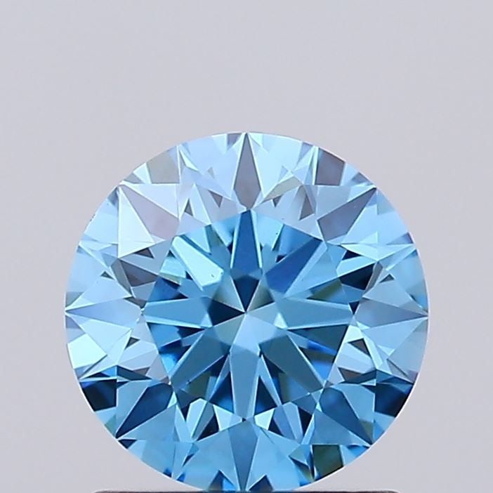 Ideal Loose Lab Diamond 1.03ct Fancy Vivid Blue VS1 - IGI Round: Ideal Loose Lab Diamond 1.03ct Fancy Vivid Blue VS1 - IGI Round Ideal loose lab diamond weighing 1.03ct, in Fancy Vivid Blue color with VS1 clarity, excellent polish and symmetry, certified by IGI. It