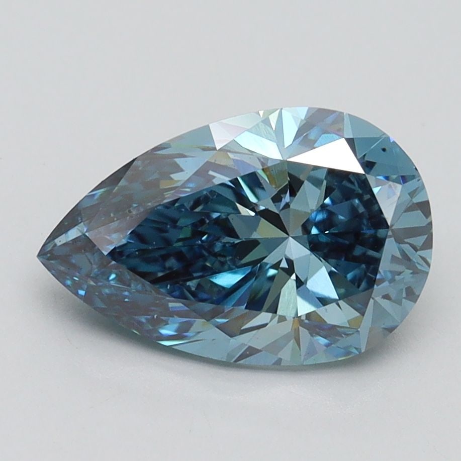 IGI Pear 1.99ct Fancy Vivid Blue VS2 - Lab Diamond Loose: IGI Pear 1.99ct Fancy Vivid Blue VS2 - Lab Diamond Loose A 1.99ct loose lab diamond with IGI certification, it showcases a Fancy Vivid Blue color, VS2 clarity, and dimensions of 10.54L x 6.84W x 4.45H