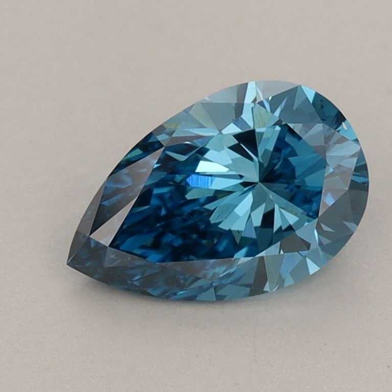 Loose Lab Diamond 1.06ct Fancy Vivid Blue VS1 - IGI Pear: Loose Lab Diamond 1.06ct Fancy Vivid Blue VS1 - IGI Pear Loose lab-grown diamond weighing 1.06ct with a Fancy Vivid Blue color and VS1 clarity, certified by IGI; measurements are 8.69L x 5.65W x 3.66H