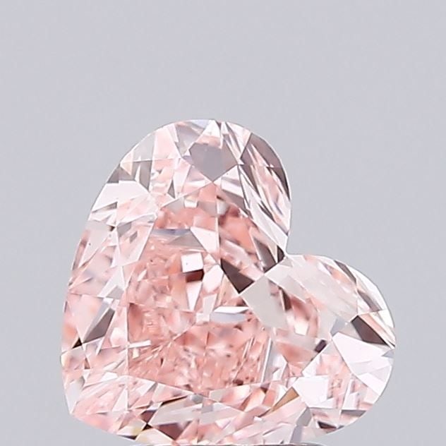 IGI 1.6ct Heart Fancy Vivid Pink VS1 - Loose Lab Diamond: IGI 1.6ct Heart Fancy Vivid Pink VS1 - Loose Lab Diamond IGI certified loose lab-grown diamond at 1.6ct, featuring a heart shape with Fancy Vivid Pink color and VS1 clarity; measurements are 7.09L x 7