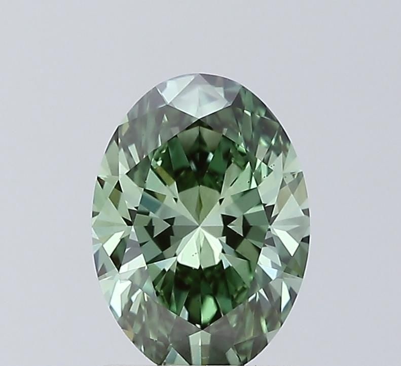 IGI 1.51ct Oval Fancy Vivid Green VS1 - Loose Lab Diamond: IGI 1.51ct Oval Fancy Vivid Green VS1 - Loose Lab Diamond Loose lab-grown diamond weighing 1.51ct with a Fancy Vivid Green color and VS1 clarity, certified by IGI; measurements are 9.08L x 6.50W x 4.0