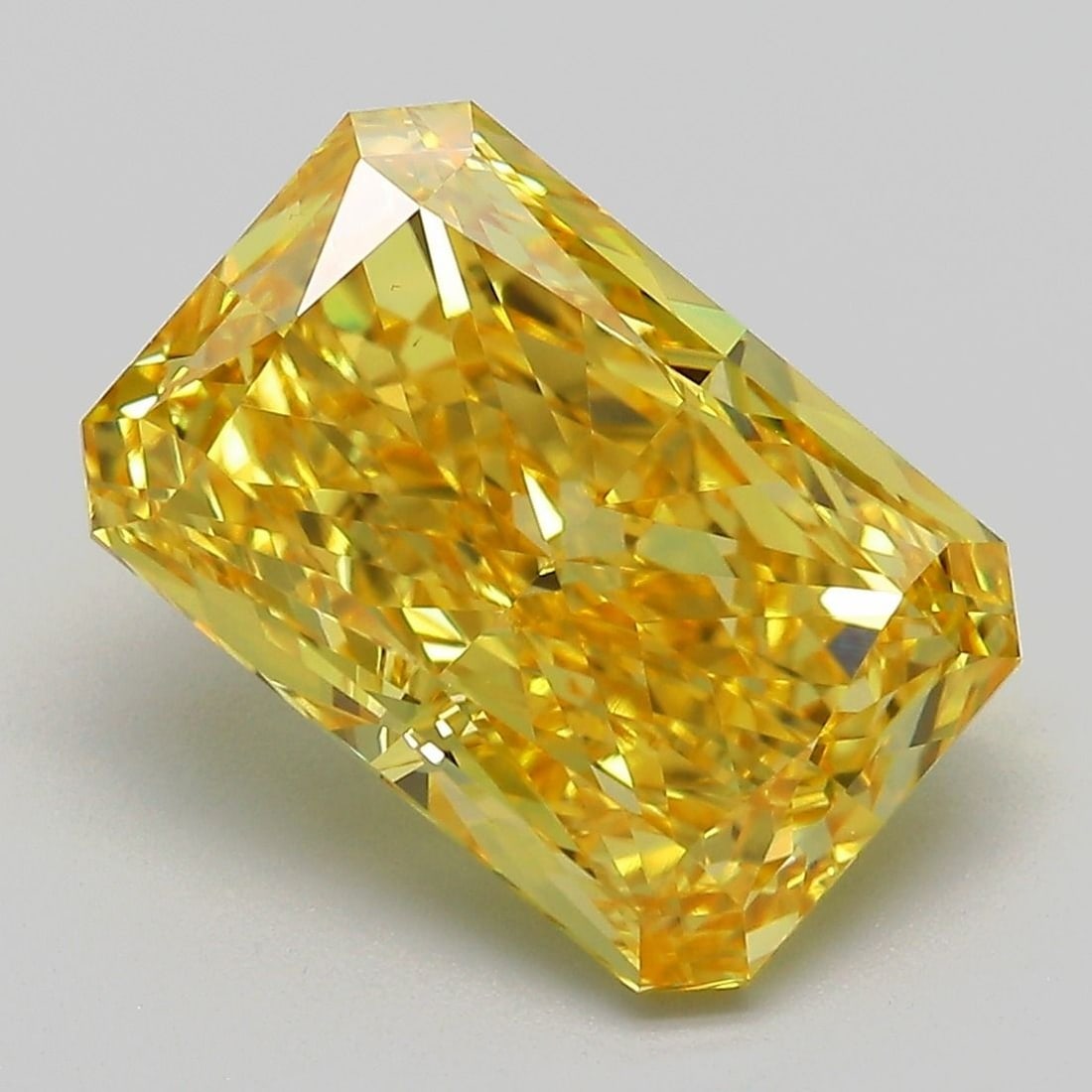IGI 4.93ct Radiant Fancy Vivid Yellow VS1 - Loose Lab Diamond: IGI 4.93ct Radiant Fancy Vivid Yellow VS1 - Loose Lab Diamond The IGI 4.93ct Radiant Fancy Vivid Yellow VS1 is a loose lab diamond with dimensions of 12.08L x 8.07W x 5.41H, characterized by very good