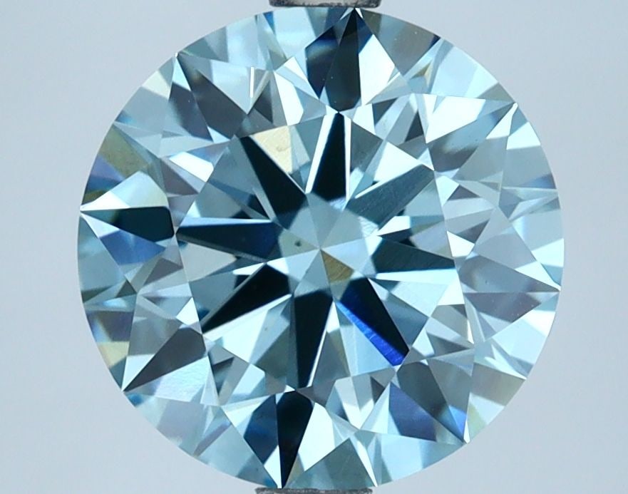 Loose Lab Diamond IGI Round 3.1ct Fancy Vivid Blue VS1 - Ideal: Loose Lab Diamond IGI Round 3.1ct Fancy Vivid Blue VS1 - Ideal Loose lab-grown diamond weighing 3.1ct with a round cut, fancy vivid blue color, clarity VS1, ideal polish and symmetry, certified by IGI
