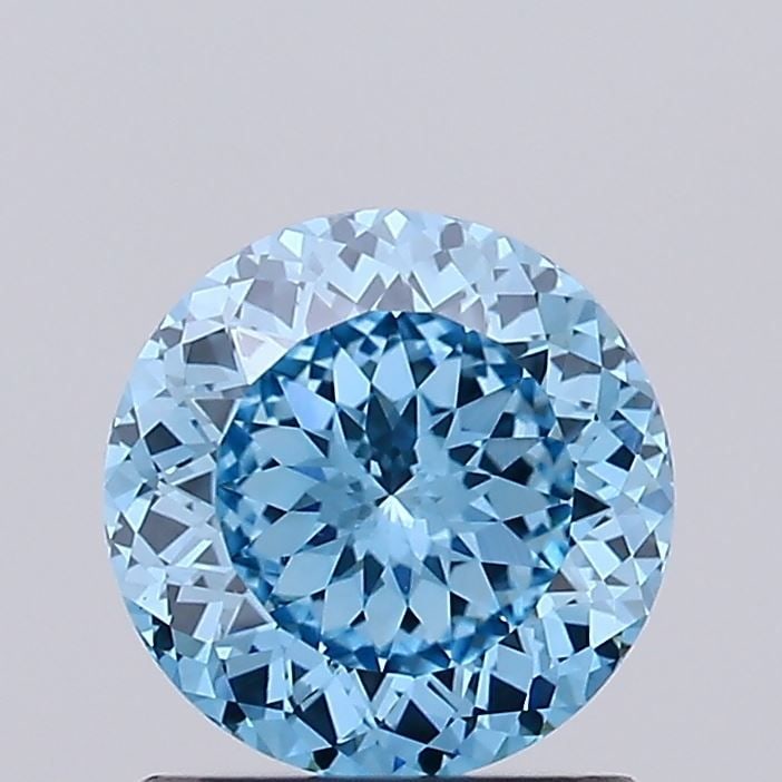 Loose Lab Diamond IGI Round 1.01ct Fancy Vivid Blue VS1: Loose Lab Diamond IGI Round 1.01ct Fancy Vivid Blue VS1 Loose Lab Diamond IGI Round weighing 1.01ct with Fancy Vivid Blue color and VS1 clarity. Certified by IGI, it features VG polish and symmetry, w