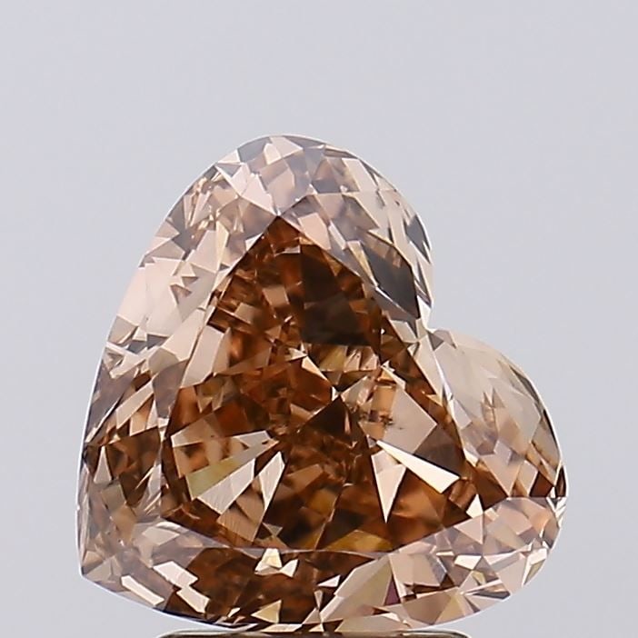 Loose Lab Diamond IGI Heart 2.75ct Fancy Brown VS1: Loose Lab Diamond IGI Heart 2.75ct Fancy Brown VS1 This is a 2.75ct loose lab-grown diamond with a heart cut, fancy brown color, and VS1 clarity, certified by IGI. It measures 8.81L x 9.64W x 4.81H mm