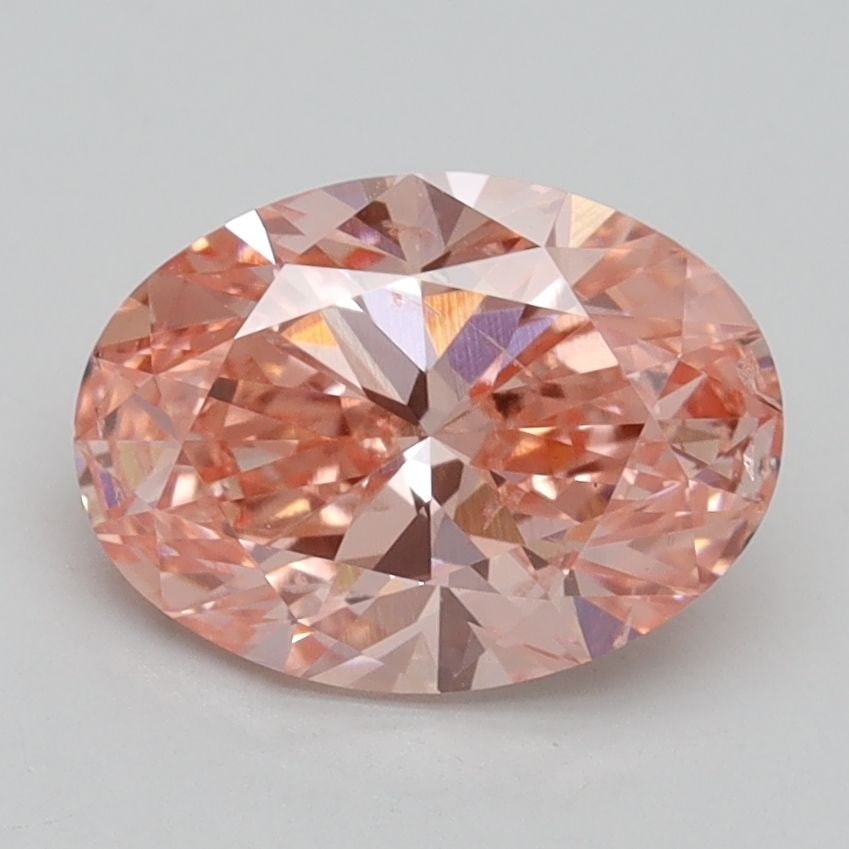 Loose Lab Diamond IGI Oval 1.9ct Fancy Vivid Pink SI2: Loose Lab Diamond IGI Oval 1.9ct Fancy Vivid Pink SI2 This loose lab-grown oval diamond weighs 1.9ct, features a Fancy Vivid Pink color, with a clarity grade of SI2. It is IGI certified with measureme