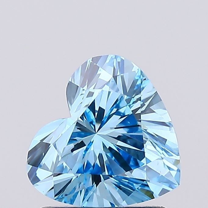 Loose Lab Diamond Heart 1.08ct Fancy Vivid Blue VS1: Loose Lab Diamond Heart 1.08ct Fancy Vivid Blue VS1 Loose lab-grown diamond weighing 1.08ct with a heart shape, Fancy Vivid Blue color, and VS1 clarity. It features excellent polish and symmetry but i